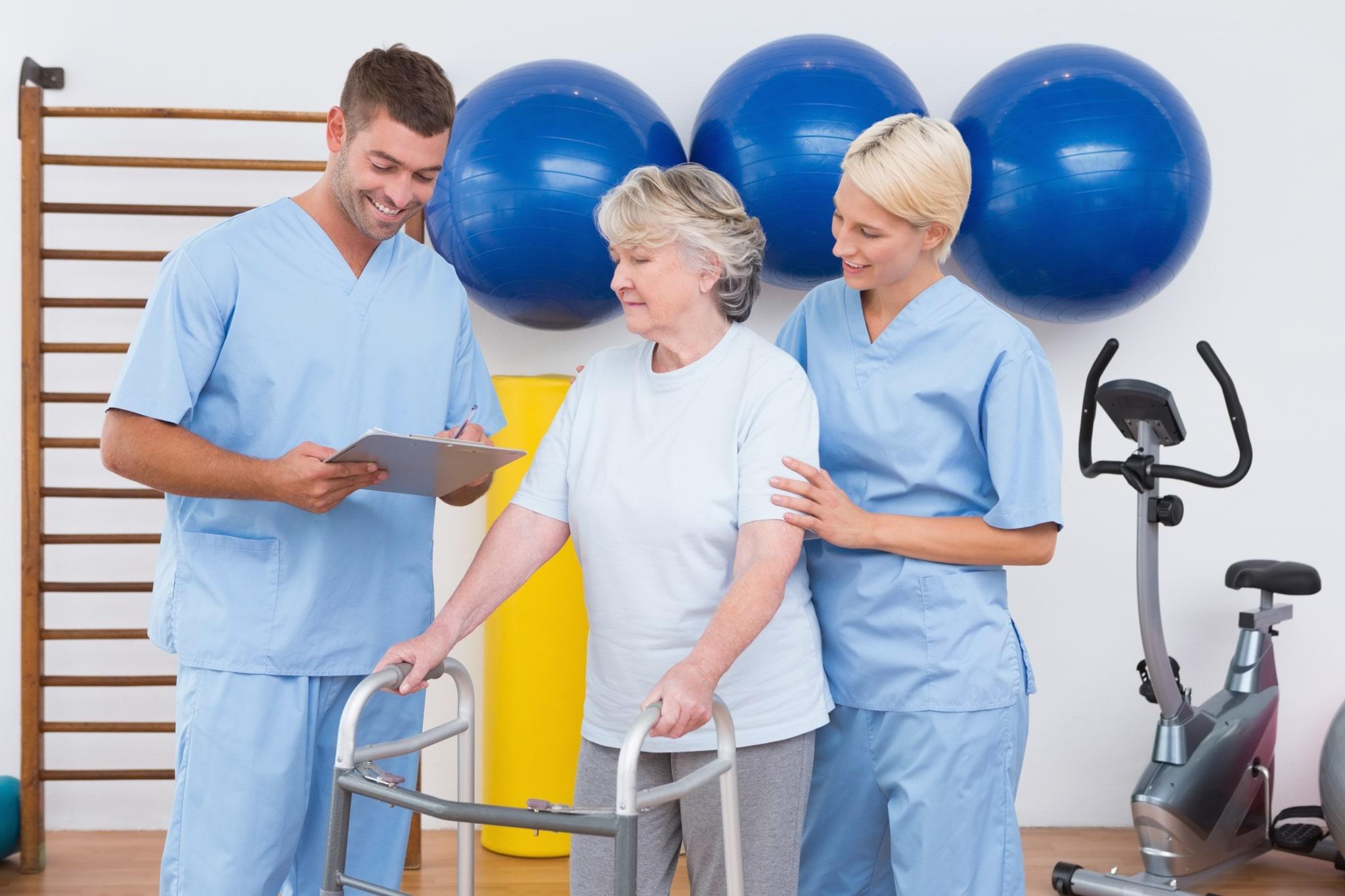 Physical therapy team with a patient